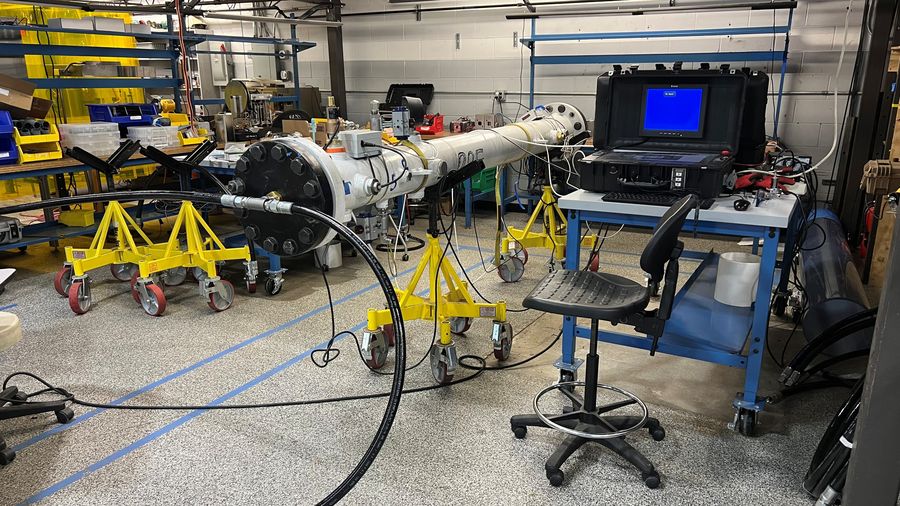 Leak detection module test setup for an in-line gas main robot